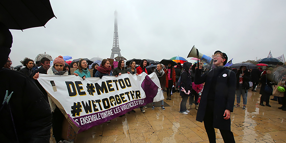 Protesters gather at the Trocadero, facing the Eiffel Tower, to rally for equality during the Women's March on Jan. 21, 2018, in Paris.  (Owen Franken/Corbis via Getty Images)