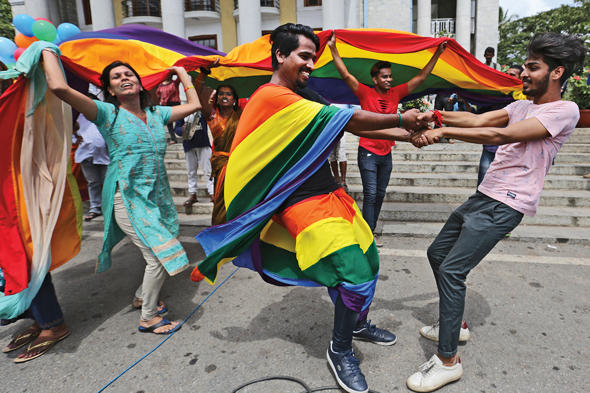 People celebrate in Bangalore on Sept. 6, 2018, after India’s top court struck down a colonial-era law that penalized gay sex. (Aijaz Rahi/AP)